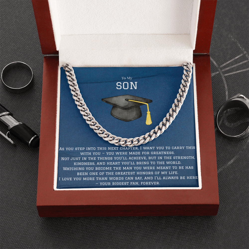 To My Son, Love Your Biggest Fan Silver Chainlink Necklace for Graduation. Message Card reads: To My Son: As you step into this next chapter, I want you to carry this with you - you were made for greatness. Not just in the things you'll achieve, but in the strength, kindness, and heart you'll bring to the world. Watching you become the man you were meant to be has been one of the greatest honors of my life. I love you more than words can say, and I'll always be here - your biggest fan forever.