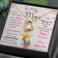 Gold Heart Necklace with Cubic Zirconia in Center and small stones on one side of the heart. Black Gift Box. Message card behind it shows a mom with a little boy on her shoulders. Card reads: To My Mom: I know it's not easy for a woman to raise a man and there is no way I can pay you back. I just want you to know that you are appreciated. It doesn't matter how far I go in life I will always be your little boy and you will always be my loving mother. I love you. Love, your son. - Givethegifts.com
