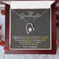 White Gold Forever Love Heart Necklace with large CZ crystal at the center and maller crystals on one side. Shown in Luxury Gift Box. Message reads: To My Granddaughter: I hugged this little pendant, I squeezed it really tight. I filled it with my wishes, hope and love and light. So when you're feeling low just hold it really tight. You'll feel my love within it morning, noon, and night. Love, Grandma