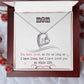 Silver heart necklace with cubic zirconia in the center and several smaller stones on one side. Shown in luxury gift box. Message reads: Mom You have loved me for as long as I have lived, but I have loved you my whole life.