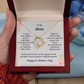 Yellow Gold Forever Love Heart Necklace with large CZ crystal at center and smaller crystals along one side. Message reads: To My Mom: I've only been with you for just a little while, I can't speak the words " I love you" so I say them with a smile. Right now I feel the safest when 'm wrapped up in your arms. I know you will protect me and keep me safe from harm. You love and care for me, like only you can do, and Mom I want to say that I really love you too. Happy 1st Mother's Day. Givethegifts.com