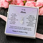 White Gold Alluring Beauty Necklace Drop Pendant Style with a Large CZ crystal in center and small crystals accenting. Message reads: To My Mom: I've only been with you for just a little while, I can't speak the words "I love you" so I say them with a smile. Right now I feel the safest when I'm wrapped up in your arms. I know you will protect me and keep m safe from harm. You love and care for me, like only you can do, and Mom I want to say that I really love you too. Happy 1st Mother's Day.