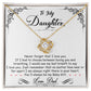 Yellow Gold Love Knot Necklace with a large CZ crystal in center, surrounded by smaller crystals. Shown in Standard Gift Box. Message reads: To My Daughter: Never forget that I love you. If I had to choose between loving you and breathing, I would use my last breath to say I love you. Just remember that no matter how near or far apart I am always right there in your heart. You'll always be my baby girl. Love, Dad