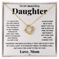 Yellow Gold Love Knot Necklace, center CZ. To My Beautiful Daughter: If I could give you one thing in life, I would give you the ability to see yourself through my eyes. Only then, would you realize how special you are to me. Always keep me in your heart, for you are always in mine. Nothing and nobody, not even time, will ever change that. I squeezed this necklace really tight, and filled it with my love and light. If I'm ever not here and you need a hug, just hold this close and feel my love. Love, Mom