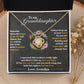 Yellow Gold Love Knot Necklace large CZ crystal in center, with smaller crystals. Standard Gift Box. Message reads: To My Granddaughter: Someday when the pages of my life end, I know that you will be one of the most beautiful chapters. Always keep me in your heart for you are always in mine. Nothing and nobody, not even time will change that. I squeezed this necklace really tight and filled it with my love and light, if I'm ever not here and you need a hug, just hold this tight to feel my love. Love Grandpa