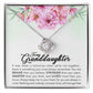 White Gold Love Knot Necklace with large CZ crystal at center and surrounding smaller crystals. Shown in Standard Gift Box. Message reads: To My Granddaughter: If ever there is tomorrow when we're not together... there is something you must always remember. You are BRAVER than you believe, STRONGER than you seem, SMARTER than you think, and LOVED more than you know. Always keep me in your heart, for you are always in mine. Nothing and nobody, not even time, will change that.