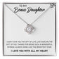 White Gold Love Knot Necklace with Large CZ crystal in center, urrounded by smaller crystals. Shown in Standard Gift Box. Message card reads: To My Bonus Daughter: I didn't give you the gift of life, life gave me the gift of you. Thanks fo rbeing such a wonderful person, always shine like the brightest star. I love you with all my heart.