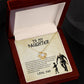 Yellow Gold Love Knot Necklace with a large CZ crystal in the center and small crystals surrounding. Shown in Luxury Gift Box and the message card says To My Daughter: I want you yo believe deep in your heart that you are capable of achieving anything you put your mind to, that you will never lose, you either win or you learn, just go forth and aim for the skies. I can't promise to be here for the rest of your life but I can promise to love you for the rest of mine. Love, Dad. Image of Dad and child.