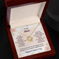 Yellow Gold Love Knot Necklace Center CZ crystal, surrounded by smaller crystals- To My Mom- I've only been with you for just a little while, I can't speak the words "I love you" so, I say them with a smile. Right now I feel the safest when I'm wrapped up in your arms. I know you will protect me and keep me safe from harm. You love and care for me, like only you can do, and Mom I want to say that I really love you too. - Givethegifts.com