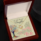 Yellow Gold Love Knot Necklace with a large CZ crystal at the center surrounded by smaller crystals. Shown in a Luxury Gift Box. Message card reads :To My Beautiful Daughter: If I could only give you one thing in this life, I would give you the ability to see yourself how I see you every single day. Your beauty, your kindness, how happy you make me and how proud I am of you. Perhaps then you would be able to understand just how special you are to me. I love you, Love, Mom. With a colorful image of a tree.