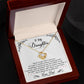 Yellow Gold Love Knot Necklace with a large CZ crystal in center, surrounded by smaller crystals. Shown in Luxury Gift Box. Message reads: To My Daughter: Never forget that I love you. If I had to choose between loving you and breathing, I would use my last breath to say I love you. Just remember that no matter how near or far apart I am always right there in your heart. You'll always be my baby girl. Love, Dad
