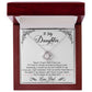White Gold Love Knot Necklace with a large CZ crystal in center, surrounded by smaller crystals. Shown in Luxury Gift Box. Message reads: To My Daughter: Never forget that I love you. If I had to choose between loving you and breathing, I would use my last breath to say I love you. Just remember that no matter how near or far apart I am always right there in your heart. You'll always be my baby girl. Love, Dad