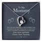 Silver Heart Necklace with Cubic Zirconia in Center and Small Stones on one side. Standard Gift Box. Message Card reads: To My Mommy: I may just be a bump. But I love you more than you ever know. Keep this close to your heart until I can meet you and rest in your arms. Love, kisses and kicks From, Your Tummy - Givethegifts.com