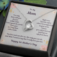 White Gold Forever Love Heart Necklace with large CZ crystal at center and smaller crystals along one side. Message reads: To My Mom: I've only been with you for just a little while, I can't speak the words " I love you" so I say them with a smile. Right now I feel the safest when 'm wrapped up in your arms. I know you will protect me and keep me safe from harm. You love and care for me, like only you can do, and Mom I want to say that I really love you too. Happy 1st Mother's Day. Givethegifts.com