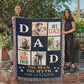 People Holding the Medium Sized Blanket Outdoors. Heirloom Woven Blanket, colorful fringe at the sides, navy blue background, with a checker print. Dad horizontal. #1 Dad/ Best Dad Ever/ Picture of Dad and Baby / Dad and Son Fishing/ Dad and Son Outdoors/ Dad with son riding bike / The Man The Myth The Legend at Bottom of Blanket