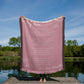 Pink Woven Blanket. Message reads: To My Mom, I've only been with you for just a little while, I can;t speak the words "I LOVE YOU" so I say them with a smile. Right now I feel the safest when I'm wrapped up in your arms. I know you will protect me , and keep me safe from harm. When you rock me in your arms to go to sleep at night, I drift soundly off to sleep as I know everything's alright. You love and care for me, like only you can do, and MOM I want to say that I really love you too. Love, Your Daughter